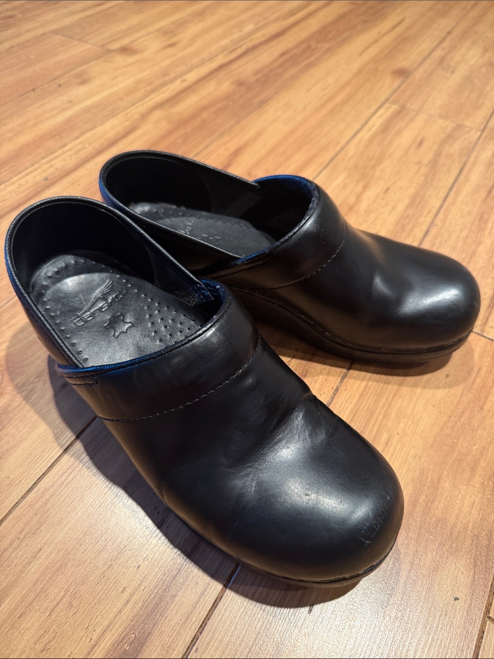 Dansko Black Leather Slip-On Clogs